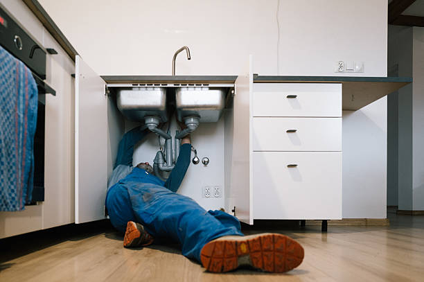 Professional Emergency Plumber technician working in Gladstone, MI